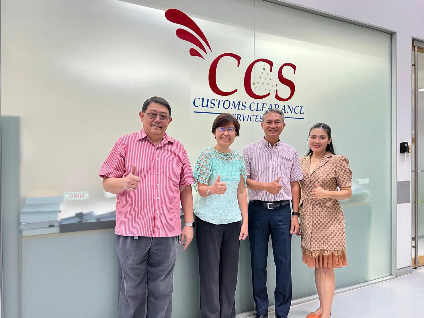 The CCS leadership team at the head office reception